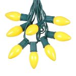 C9 25 Light String Set with Ceramic Yellow Bulbs on Green Wire