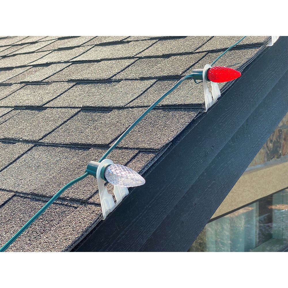 Shingle clip attached securely to roof edge
